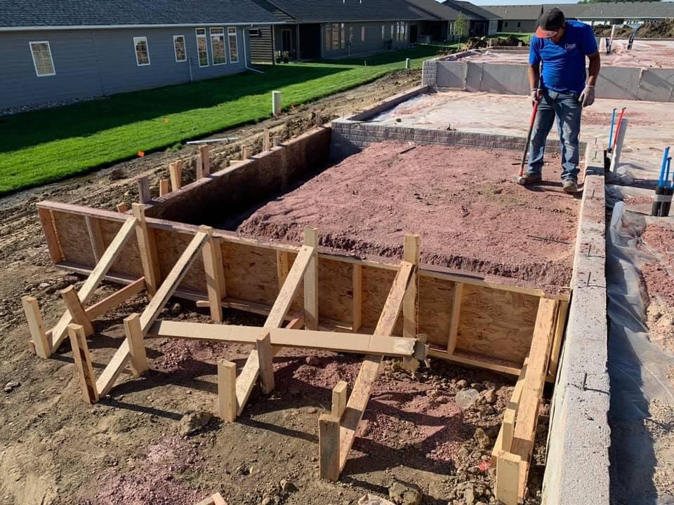 Wood forms built and set over graded ground, ready for the pour